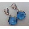 Zilveren oorbellen met blauwe Topaas quartz briolet en Zirkonia
