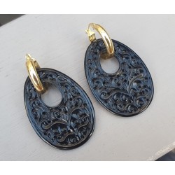 Creolen met ovale filligree /uitgesneden hanger van zwarte Onyx