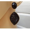 Vergulde oorbellen met ovale Onyx en uitgesneden Onyx