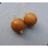Vergulde hanger set met bol van oranje Slangenleer