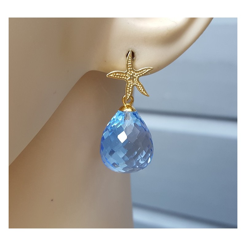 Oorbellen met zeester en blauw Topaas quartz briolet