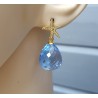 Oorbellen met zeester en blauw Topaas quartz briolet