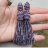Tassel oorbellen met paarse kristallen
