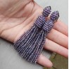Tassel oorbellen met paarse kristallen