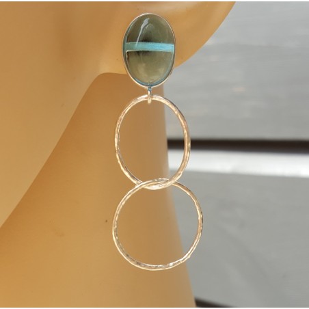 Zilveren oorbellen met blauw Topaas en zilveren ringen