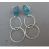 Zilveren oorbellen met blauw Topaas en zilveren ringen