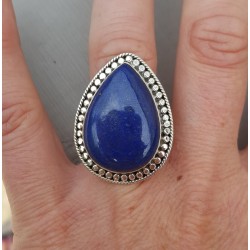 Zilveren ring gezet met druppelvormige Lapis Lazuli verstelbaar