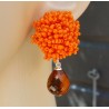 Oorbellen oorknoppen van oranje kraaltjes en Citrien quartz
