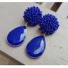 Vergulde oorbellen met blauwe kraaltjes en blauw Chalcedoon briolet