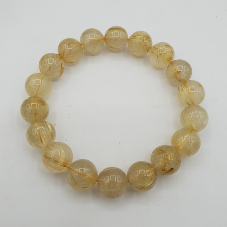 Stretch armband met gouden Rutielkwarts kralen