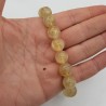 Stretch armband met gouden Rutielkwarts kralen