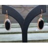 Vergulde oorbellen gezet met ovale facet Onyx en Zirkonia