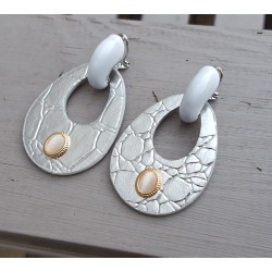 Vergulde creolen met zilveren oorhangers van Ecoleather en ornamenten