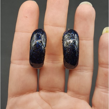 Goudkleurige brede donker blauwe glitter creolen