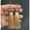 Vergulde beige tassel oorbellen met kristallen en parel