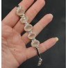 Zilveren armband gezet met vijf ovale facet Rozenkwarts stenen