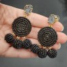 Zwarte beaded oorbellen en Agaat geode