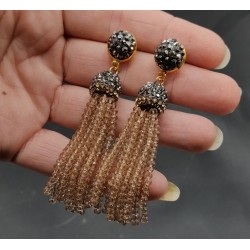 Tassel oorbellen met champagne kleurige kristallen