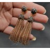 Tassel oorbellen met champagne kleurige kristallen