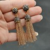 Tassel oorbellen met champagne kleurige kristallen