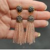 Tassel oorbellen met licht toze kristallen