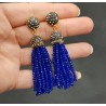 Tassel oorbellen met blauwe kristallen