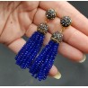 Tassel oorbellen met blauwe kristallen