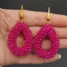 Vergulde oorbellen open druppel van fuchsia roze kristallen