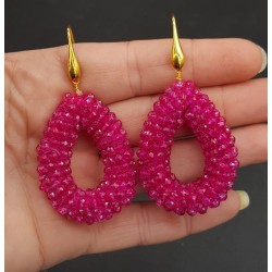 Vergulde oorbellen open druppel van fuchsia roze kristallen