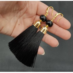 Vergulde oorbellen met zwarte tassel en Onyx