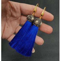 Vergulde blauwe tassel oorbellen met kristallen en parel