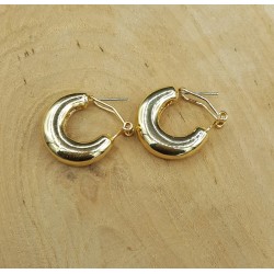 Goud kleurige brede creolen