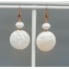 Oorbellen met ronde ivoor witte schelp en schelp parel