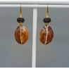 Oorbellen met schelp en Smokey Topaas