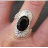 Zilveren ring gezet met ovale facet geslepen Onyx 18 mm