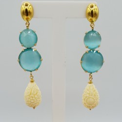 Vergulde oorbellen met aqua blauwe Kattenoog en Resin