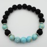 Stretch armband met Turkoois blauwe Sediment Jaspis en zwarte Lava stenen