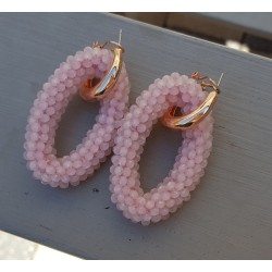 Creolen met grote ovale van roze Kristallen