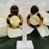 Goud kleurige oorbellen met resin hanger