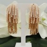 Vergulde waterval tassel oorbellen creme
