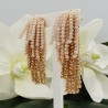 Vergulde waterval tassel oorbellen creme