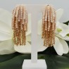 Vergulde waterval tassel oorbellen creme