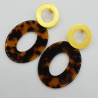Vergulde oorbellen met ovale schildpad resin hanger