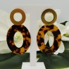 Vergulde oorbellen met ovale schildpad resin hanger