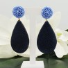 Vergulde oorbellen met blauwe kristallen en blauw Roggenleer