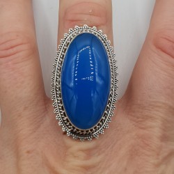 Zilveren ring met blauw Chalcedoon en bewerkte kop 19 mm