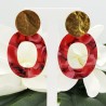 Oorbellen met rode resin hanger