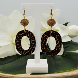 Vergulde oorbellen met gouden kristallen en resin