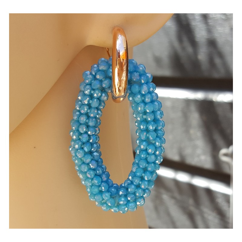 Creolen met grote ovale blauw kleurige Kristallen