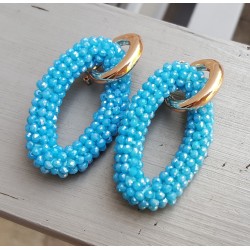 Creolen met grote ovale blauw kleurige Kristallen